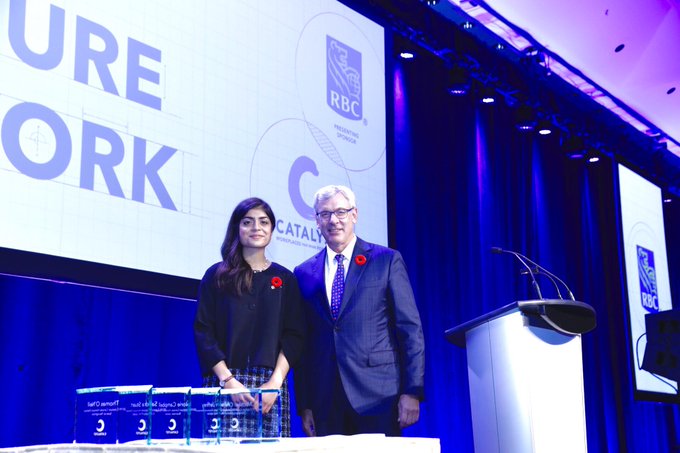 Dave McKay, President and CEO, @RBC alongside Plan Canada Youth Ambassador Aiza Abid