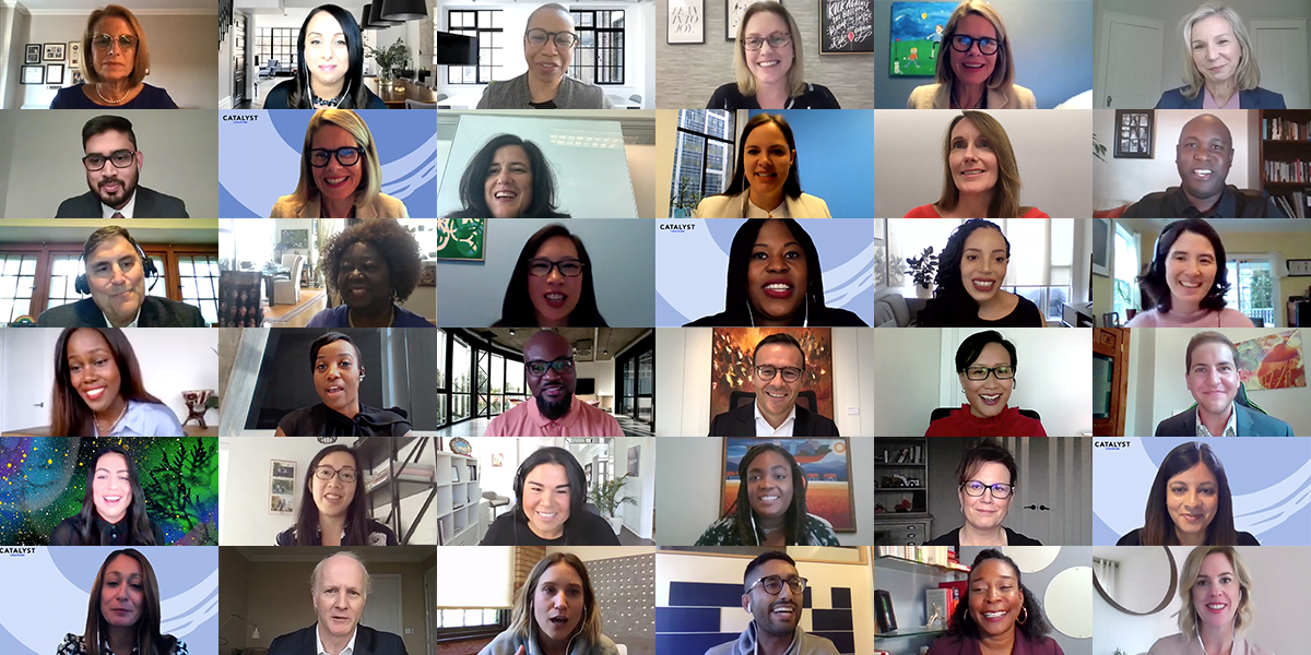 Many faces on a virtual conference screen.