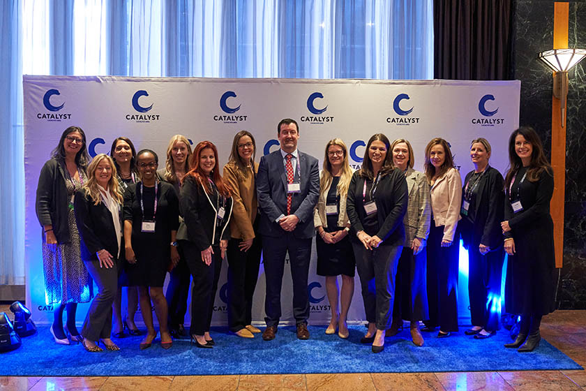 2023 Catalyst Awards attendee group photo in front of Catalyst backdrop
