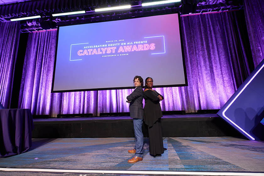 2023 Catalyst Awards Two People Posed Back to Back