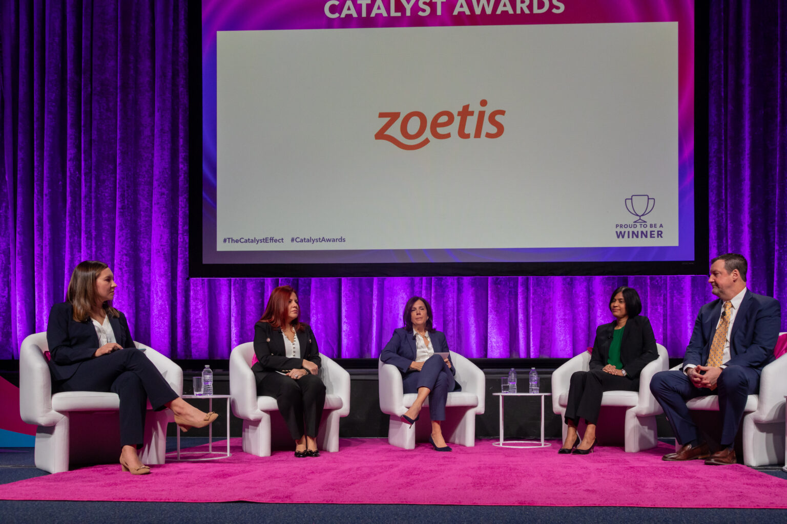 Leaders from Zoetis, Catalyst Award Winner sit on stage to discuss DEI best practices.